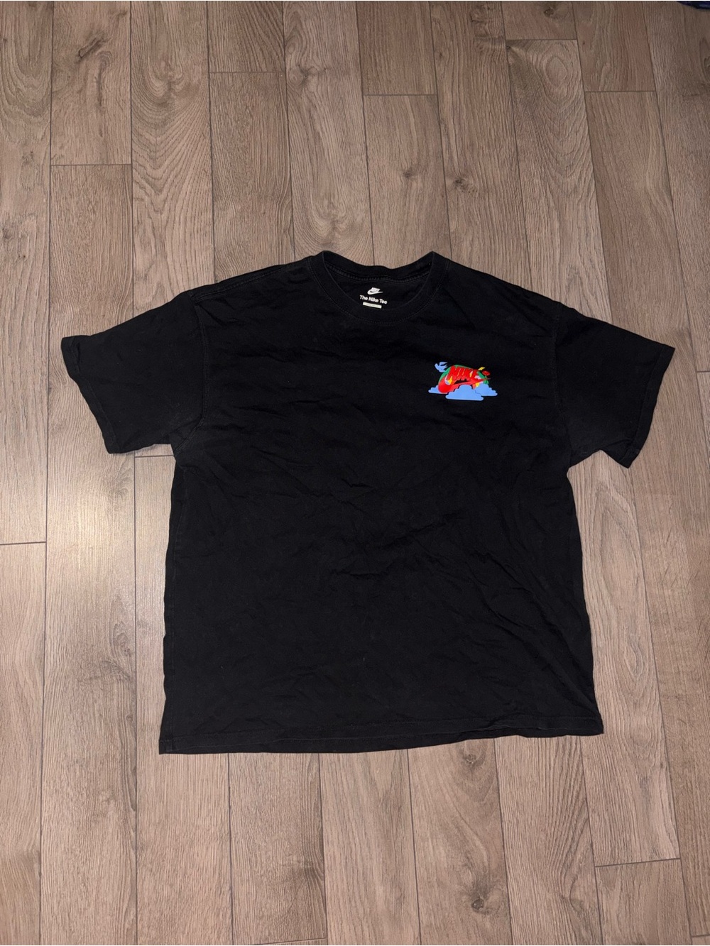 Nike Black Short Sleeve Tee with Small Colorful Fish Graphic